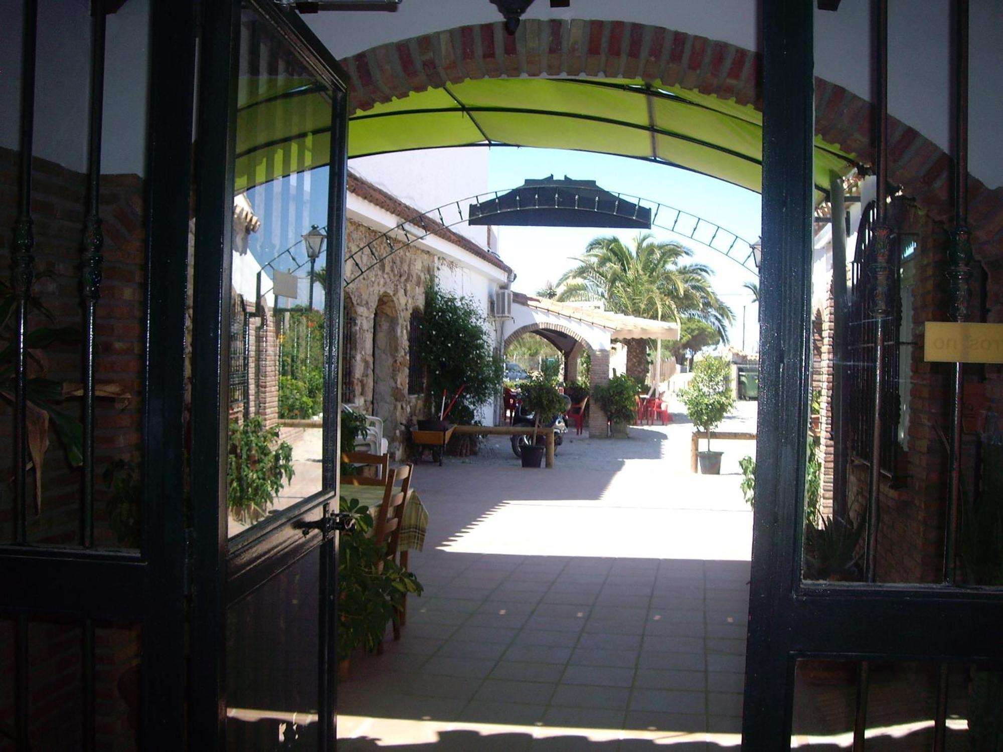 Hostal Mini Golf ลอสกาญอสเดเมกา ภายนอก รูปภาพ